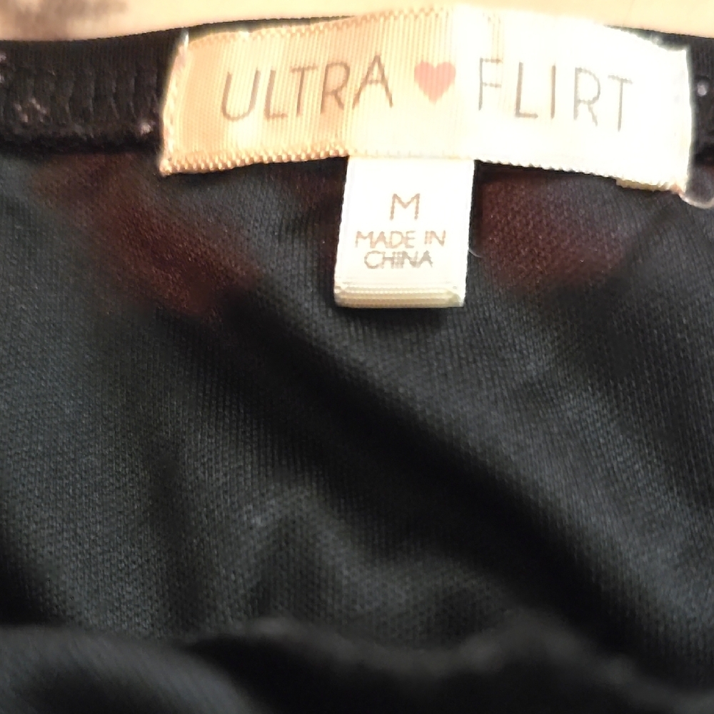 Black Mini Form Fitting ,Long Mini Or Pulled Up - image 5